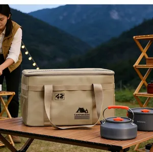 Large capacity outdoor camping storage bag for cookware in a scenic mountain setting