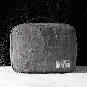 Bolsa organizadora gris impermeable para cables cargadores y bancos de energía