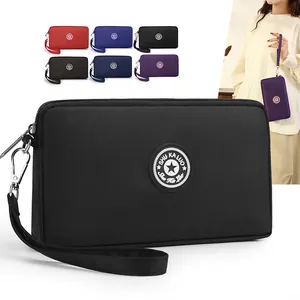Pochette téléphone minimaliste couleur unie grande capacité avec dragonne pratique