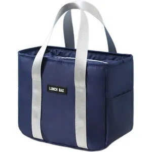 Insulated waterproof navy blue lunch bag with silver handles and side pocket