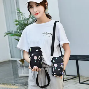 Fashionable small crossbody phone bag with hot air balloon print and heart zipper charm