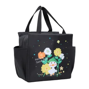 Cute cartoon duck insulated lunch bag with side pockets in black, durable oxford fabric