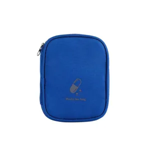 Compact blue portable medicine bag with capsule icon for travel or home storage.