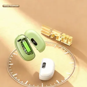Portable magnetic hand warmer with digital display and internal battery view
