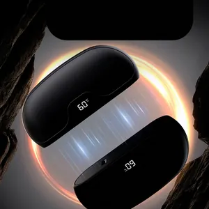 Portable magnetic hand warmer with digital temperature display and detachable design.