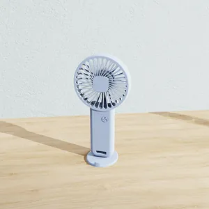 Portable handheld USB rechargeable mini fan with standing base in light blue color