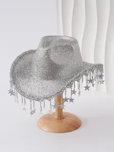 Detail view of sparkling silver western cowboy hat with dangling star tassels.