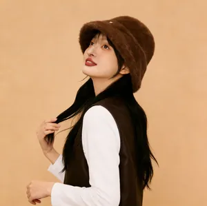 Asian model showcasing a brown fuzzy wool bucket hat for warm autumn and winter style