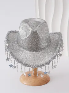 Detail view of silver cowboy hat featuring sparkly star tassels for party stage wear.