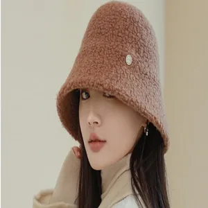 Warm brown sherpa bucket hat for women, featuring a soft winter fleece plush texture.