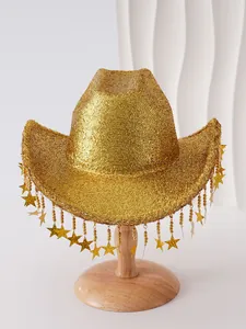Detailed macro view of a shiny gold glitter cowboy hat with star tassel fringes for parties