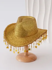 Detailed view of a glittering gold cowboy hat with hanging star-shaped tassels.