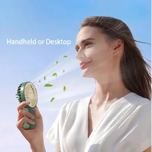 Portable USB rechargeable handheld fan for desktop and outdoor use in stylish green