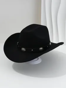 Detail view of a black Western cowboy hat with silver flower studs on a leather band.