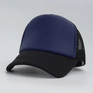 Detailed view of a navy blue and black mesh trucker baseball cap with curved brim