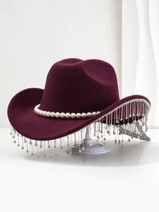 Detailed view of burgundy hat with elegant pearl trim and sparkling rhinestone fringe decoration