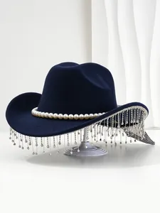 Detail of navy blue fedora hat featuring elegant pearl band and rhinestone tassel fringe