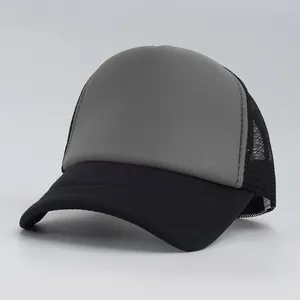 Close-up of a two-tone grey and black mesh trucker baseball cap with curved brim