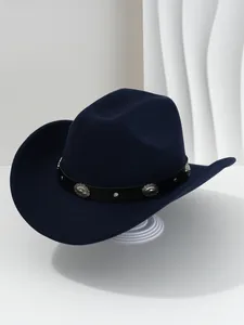 Detailed view of navy blue western cowboy hat with flower-shaped metal studs and wide brim