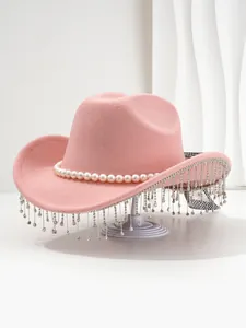 Detailed view of pink wool hat with elegant pearl band and sparkling rhinestone fringe