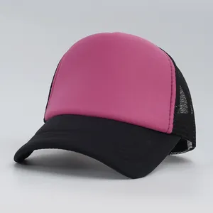 Detailed close-up view of a pink and black mesh trucker hat with a curved brim design.