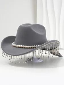 Detail view of a gray wool hat with elegant pearl band and sparkling rhinestone fringe