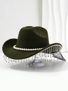 Detailed view of dark green felt hat with pearl band and rhinestone fringe decoration