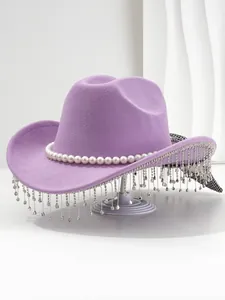 Detailed view of purple cowboy hat with elegant pearl band and shimmering rhinestone tassels.