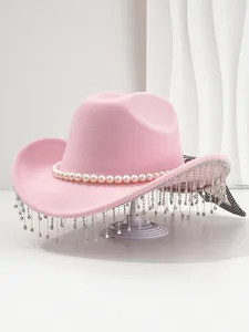 Elegant pink felt cowboy hat featuring a pearl band and sparkling rhinestone fringe detail