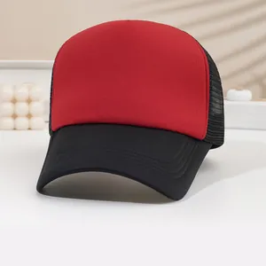 High-quality red and black two-tone mesh trucker baseball hat in a clean setting