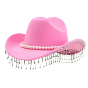 Fashionable pink cowboy hat with pearl trim and sparkling rhinestone fringe tassels