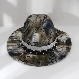 Detailed view of unisex graffiti print fedora hat featuring pearl and rhinestone band