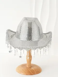 Detailed view of a silver sequined cowboy hat featuring shiny star tassels on the brim