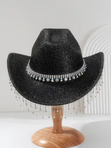 Detail of black glitter Y2K cowboy hat featuring shiny rhinestone tassel fringes