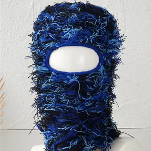 Detail view of the shaggy blue and black distressed knit one-hole ski mask texture