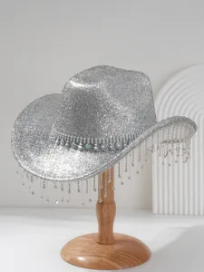 Close-up of sparkling silver cowboy hat with crystal fringe and rhinestone band