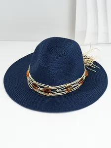 Elegant navy blue Panama straw hat with amber bead woven band for beach or travel use