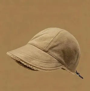 Detailed view of a khaki corduroy cap with warm fleece lining and adjustable back toggle.