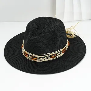 Black Panama straw hat for women with amber gemstone rope band and wide brim