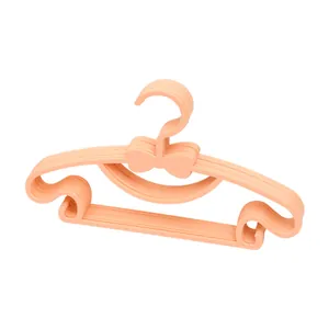 Set pfirsichfarbene Kinderkleiderbügel aus Kunststoff mit rutschfestem Schleifendesign