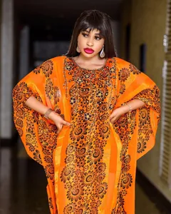 African chiffon maxi dress with floral prints, rhinestones and beads decoration.
