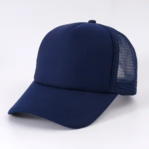 Close-up detailed view of a navy blue foam trucker hat featuring a breathable mesh back