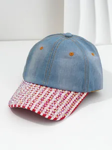 Stylish blue denim baseball cap for women with shimmering rhinestone brim detail