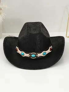 Close-up of vintage black cowboy hat featuring a turquoise and gemstone band