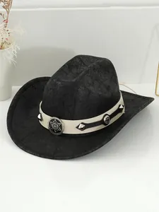 Detailed view of vintage black cowboy hat with wide brim, rivet band and distressed texture