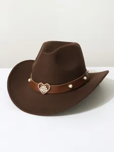 Close-up of brown wool western cowboy hat with heart rhinestone and pearl decoration