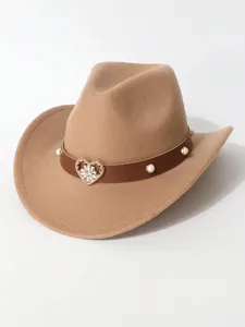 Detailed view of a camel wool cowboy hat with a sparkling heart rhinestone buckle