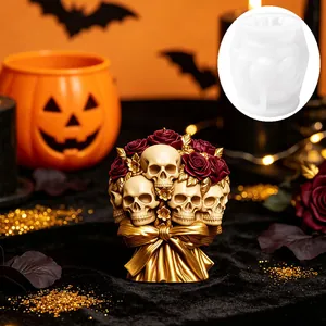 Close-up of DIY Halloween skull and rose candle mold with finished gold sample.