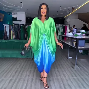Elegant African Bubu dress featuring a green and blue gradient with stylish batwing sleeves