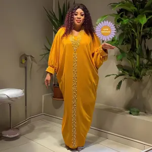 Yellow African Bubu dress with V-neck, batwing sleeves and intricate beading